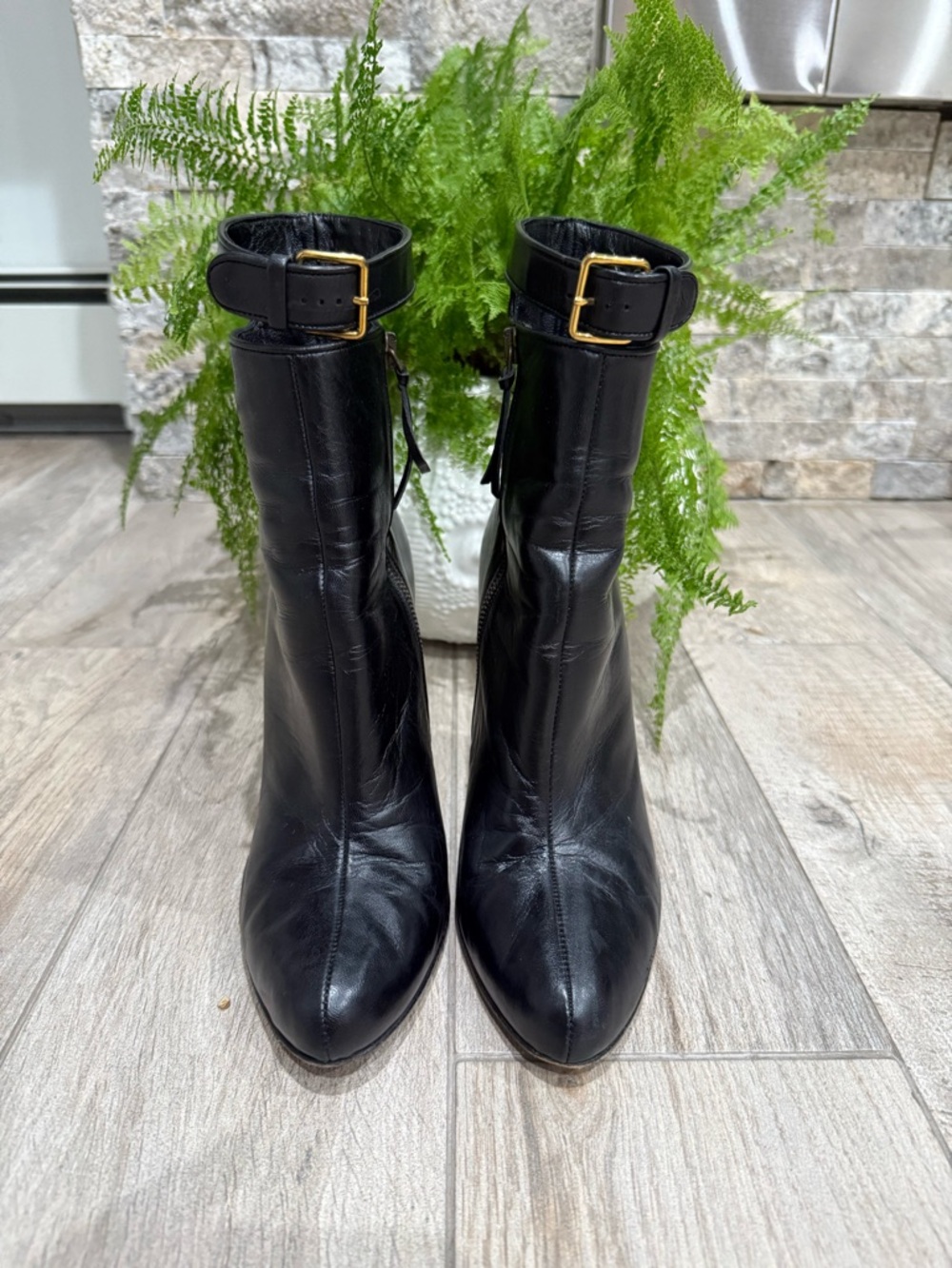 Miu Miu Black Leather Pointed Ankle Boots with Gold Buckle